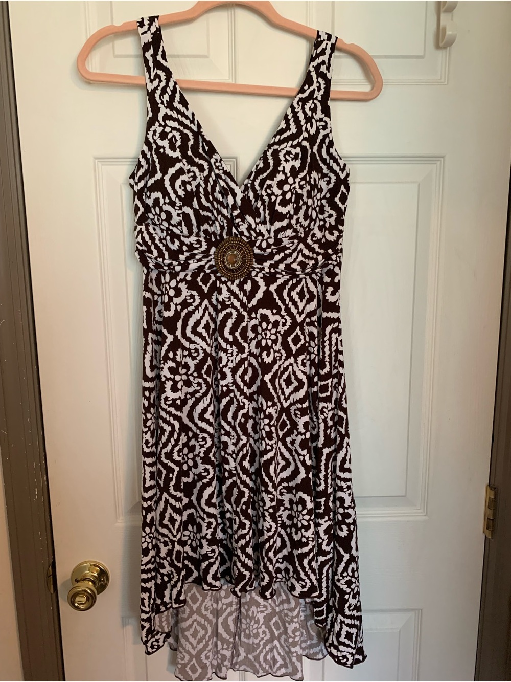 Enfocus Studio Brown and White High-Low V-Neck Dress with Decorative Medallion